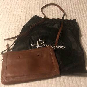 Never used saddle brown leather crossbody purse